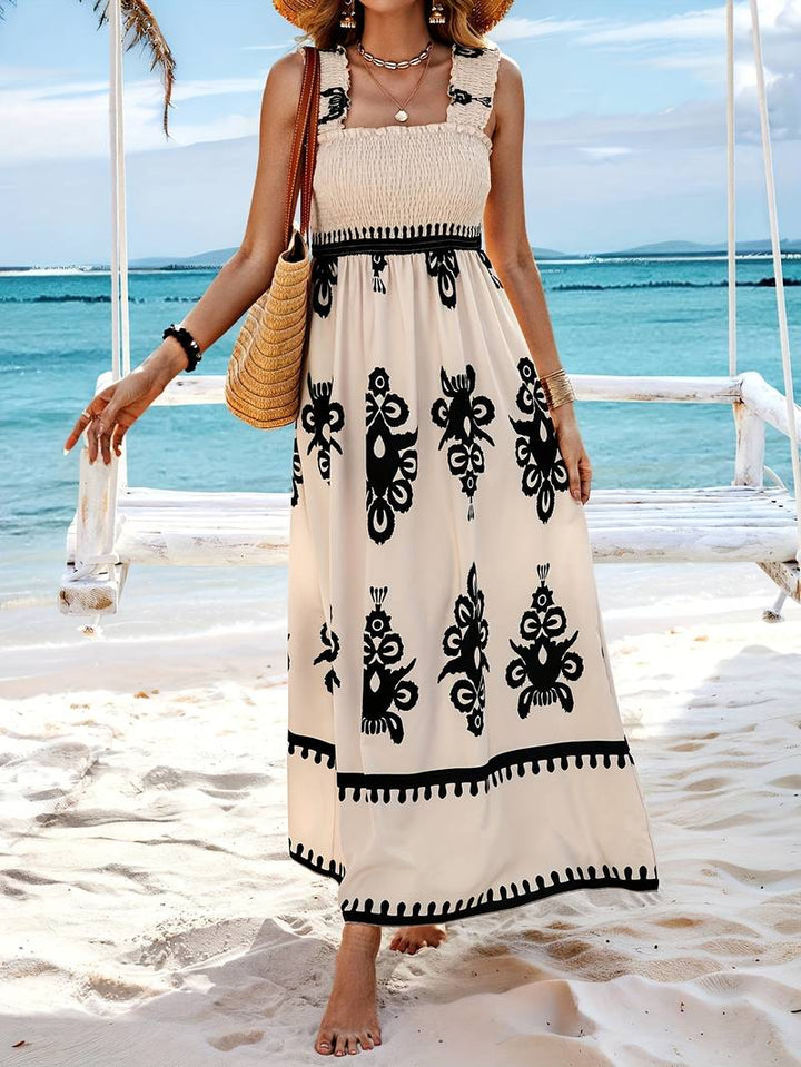Robe longue femme style bohème maxi, confortable et fluide, avec motifs pour un été décontracté et stylé.
