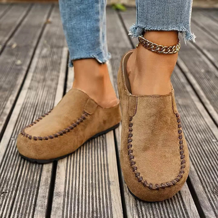 Chaussures mules vintage décontractées pour femmes, offrant un confort inégalé et un style rétro chic quotidien.