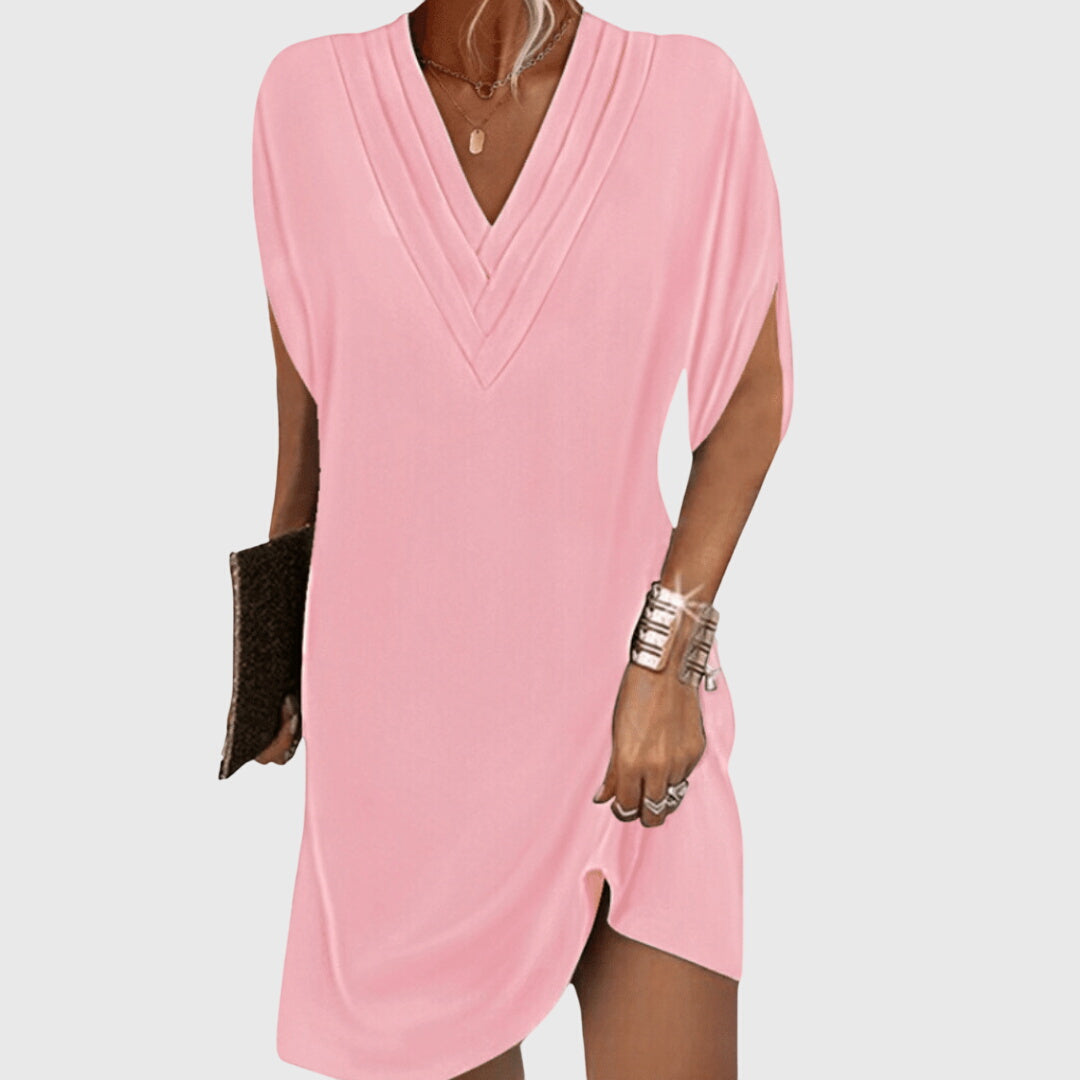 Robe chic fluide pour femme, coupe amincissante et décolleté V. Parfaite pour le confort et le style féminin.