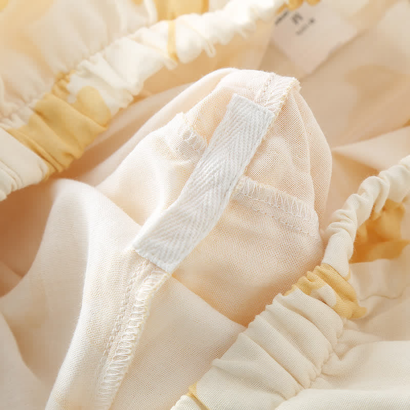 Pyjama femme 2 pièces : Confort et élégance avec son motif ginkgo. Idéal comme ensemble de nuit ou détente.