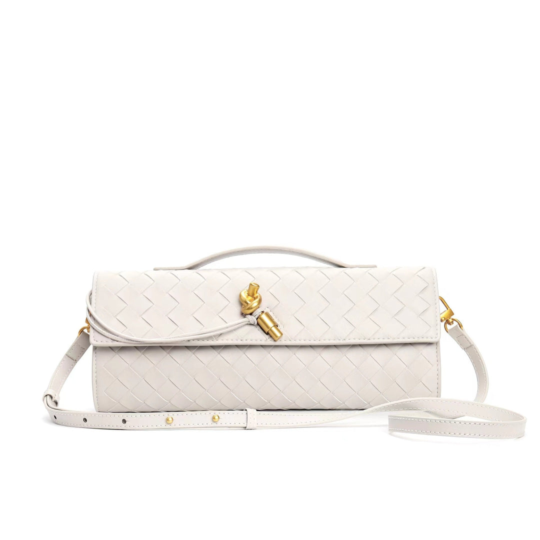 Sac à main en cuir tressé, couleur camel, accessoire de mode intemporel pour femme.