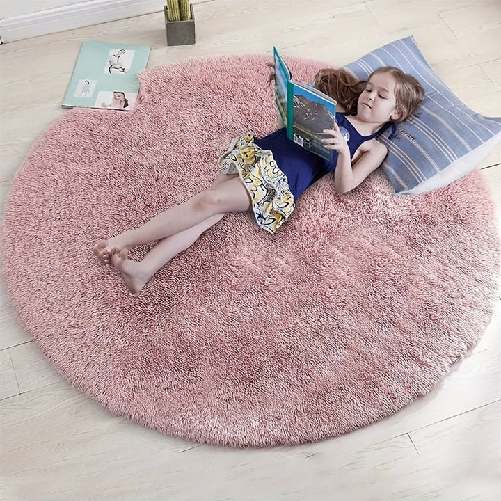Tapis rond Clouda, idéal pour une ambiance cosy et chaleureuse dans votre maison.
