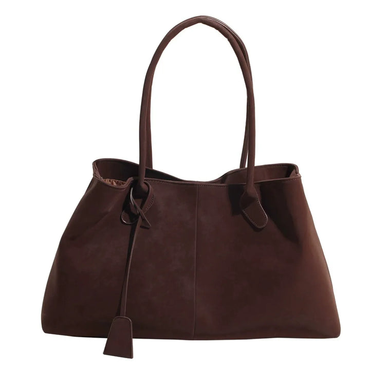 Sac femme fourre-tout pratique et spacieux, idéal pour le travail, alliant mode et fonctionnalité.