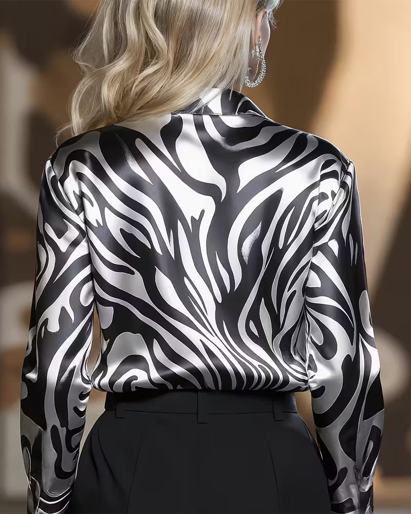 Chemise femme décontractée chic, imprimée col V. Manches longues, très confortable pour l'automne.