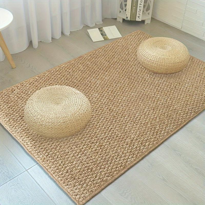 Tapis d'accueil tissé, alliant douceur et résistance, parfait pour l'entrée et un style moderne.