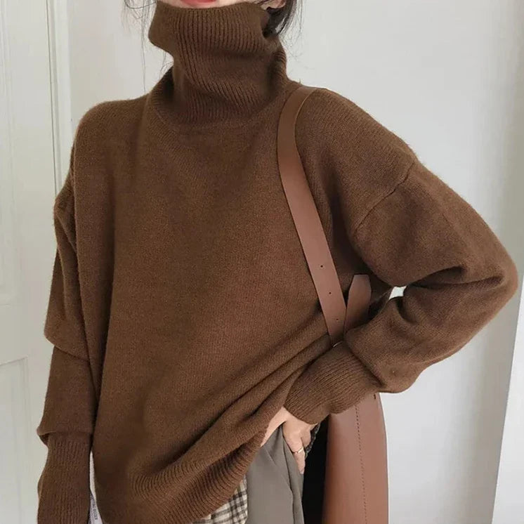 Pull femme col roulé matelassé, élégant et confortable pour l'hiver et l'automne. Mode et chaleur assurées.