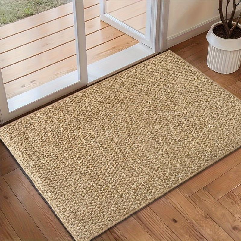 Tapis de porte tissé doux et élégant, parfait pour une entrée moderne et une décoration intérieure accueillante.