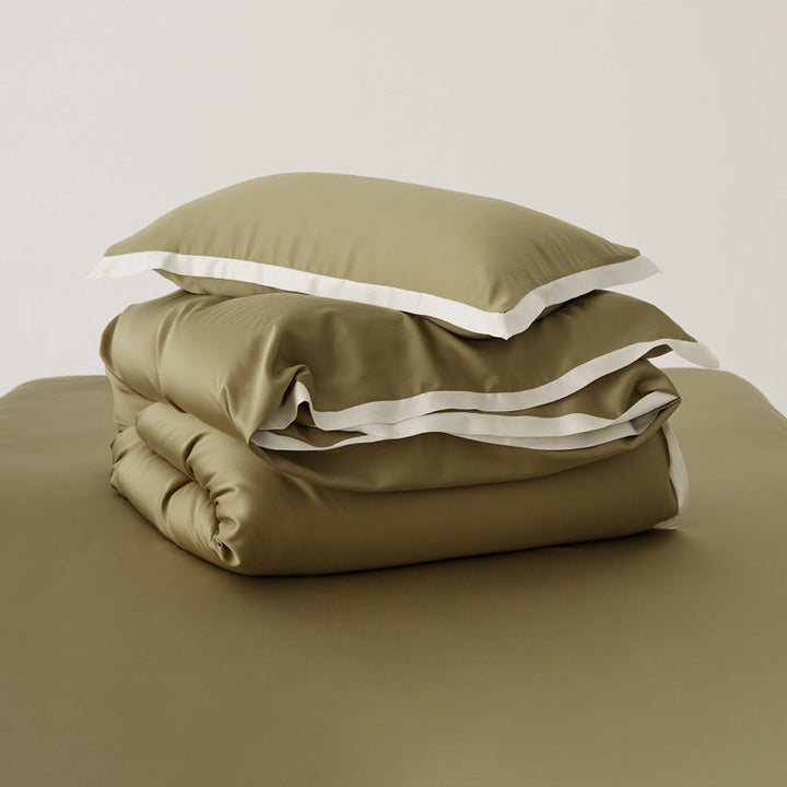 Sensation luxueuse de l'ensemble de literie Tencel patchwork, doux, élégant et respirant pour chambre confortable.