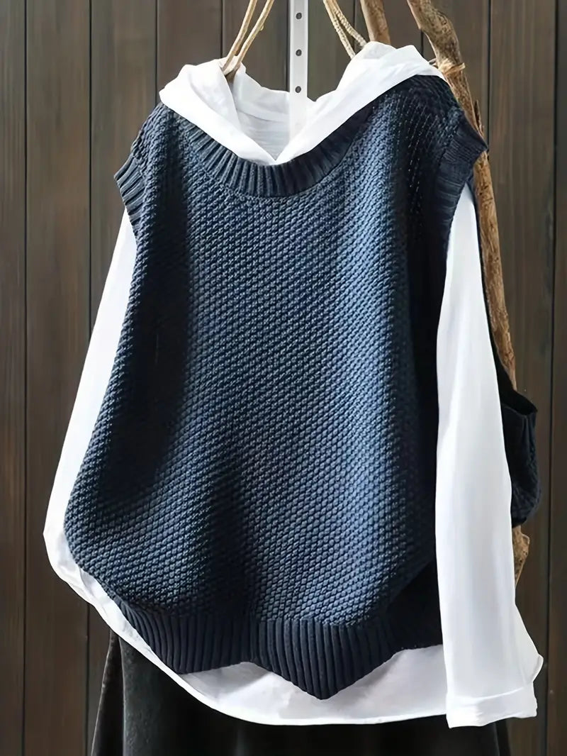 Chandail sans manches femme bleu marine, élégant et décontracté. Parfait pour le bureau ou une tenue quotidienne.