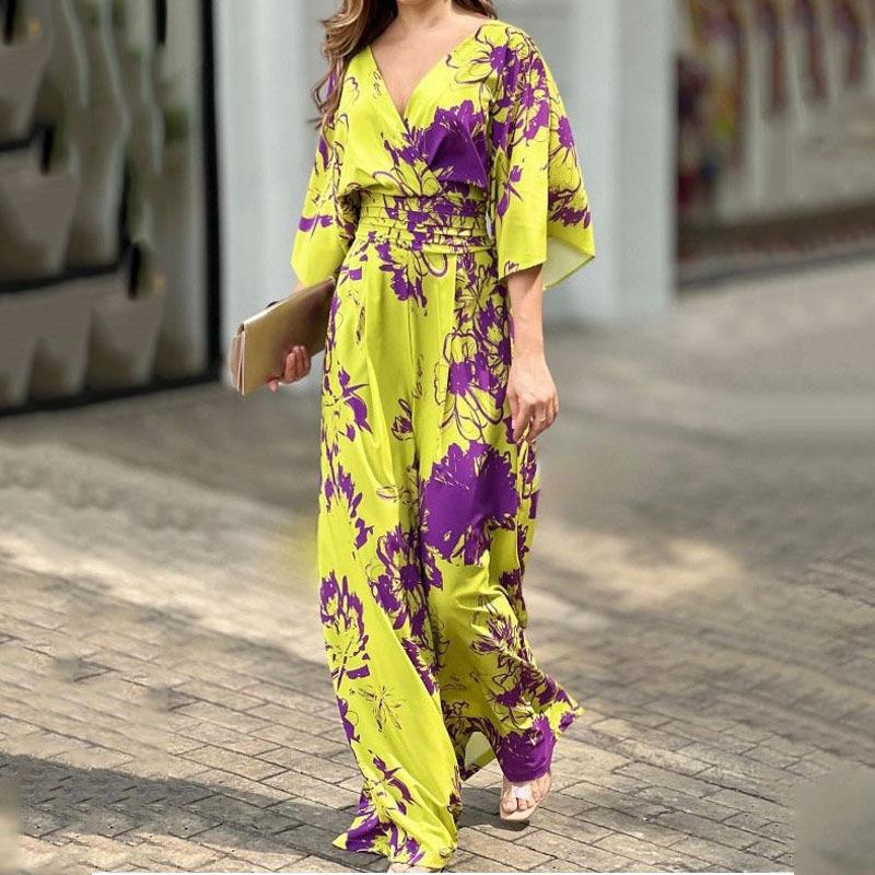 Combinaison florale femme polyvalente, taille haute, jambe large, idéale pour l'été et les soirées.