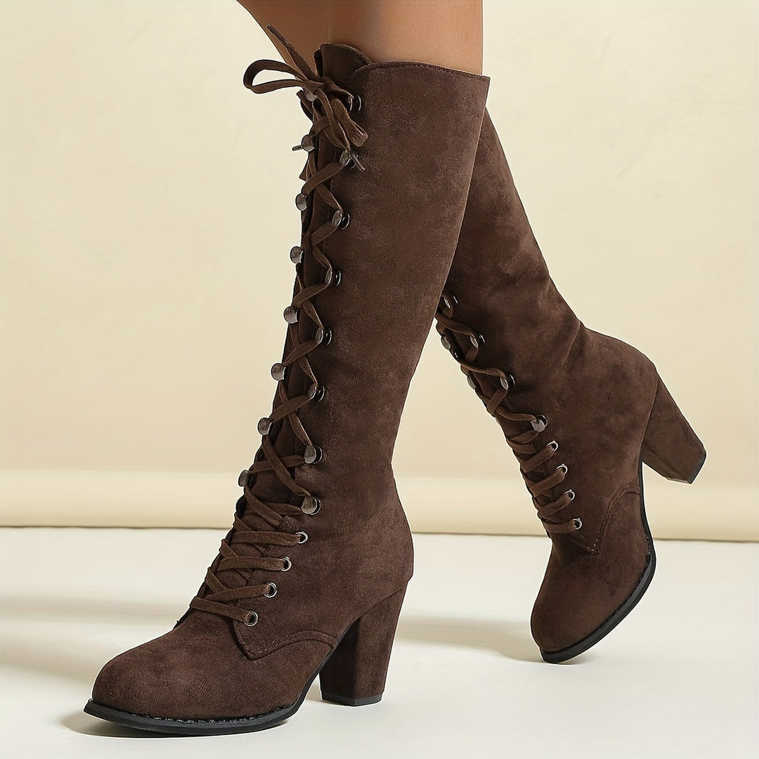 Chaussures bottes hautes Lucia, l'accessoire mode chic et confortable pour femme en hiver. Tendance garantie.