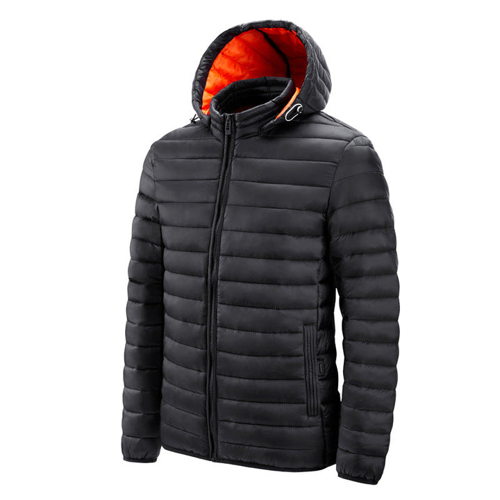 Gros plan sur la texture isolante de la veste matelassée thermique homme. Tissu coupe-vent pour chaleur et confort.