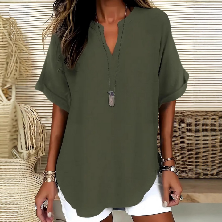 Blouse femme fluide chic, manches courtes, col V. Pour un style élégant et décontracté d'été.