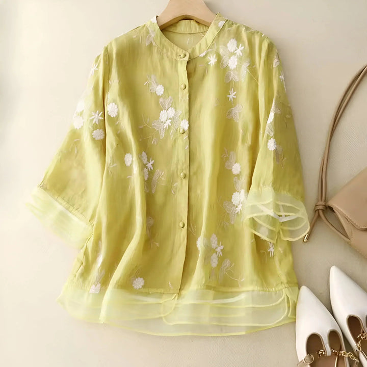 Blouse femme confortable, fluide et chic, avec broderie florale. Idéale printemps/été.