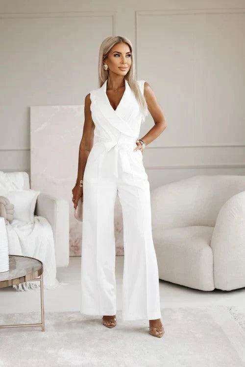 Combinaison femme chic, col blazer, jambes larges, ceinture. Idéale pour tenue de bureau ou habillée.