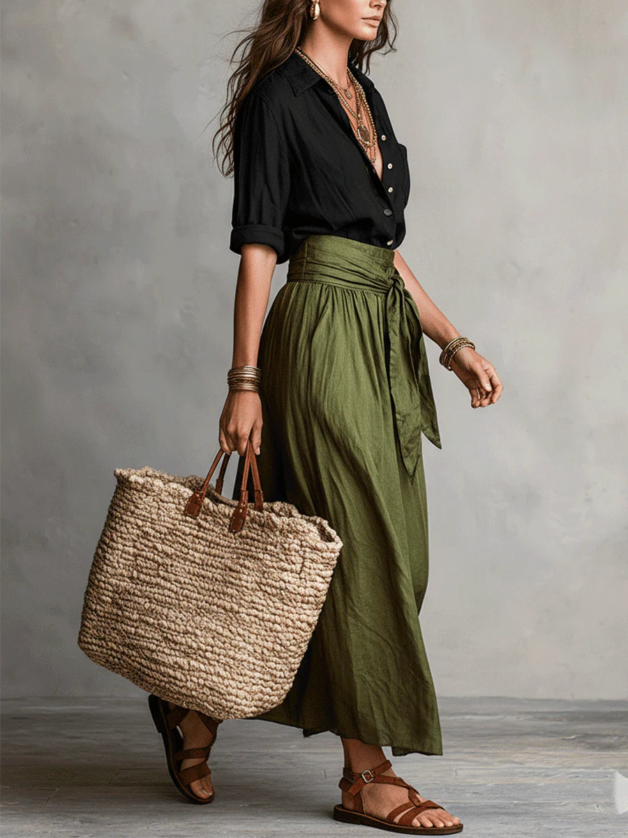 Mode femme élégante: ensemble chemise et jupe midi taille haute avec détail ceinture. Créez une tenue chic et tendance.
