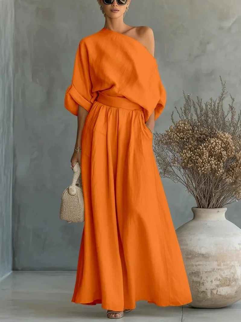 Top oversize épaule dénudée et pantalon sarouel : ensemble deux pièces femme chic et confortable pour un style bohème.
