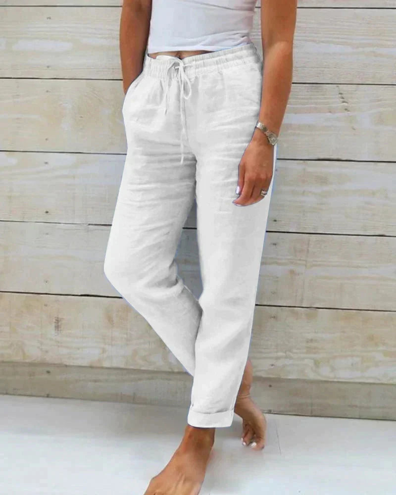 Pantalon femme long à taille élastique avec cordon de serrage, idéal pour le confort quotidien et un style chic.