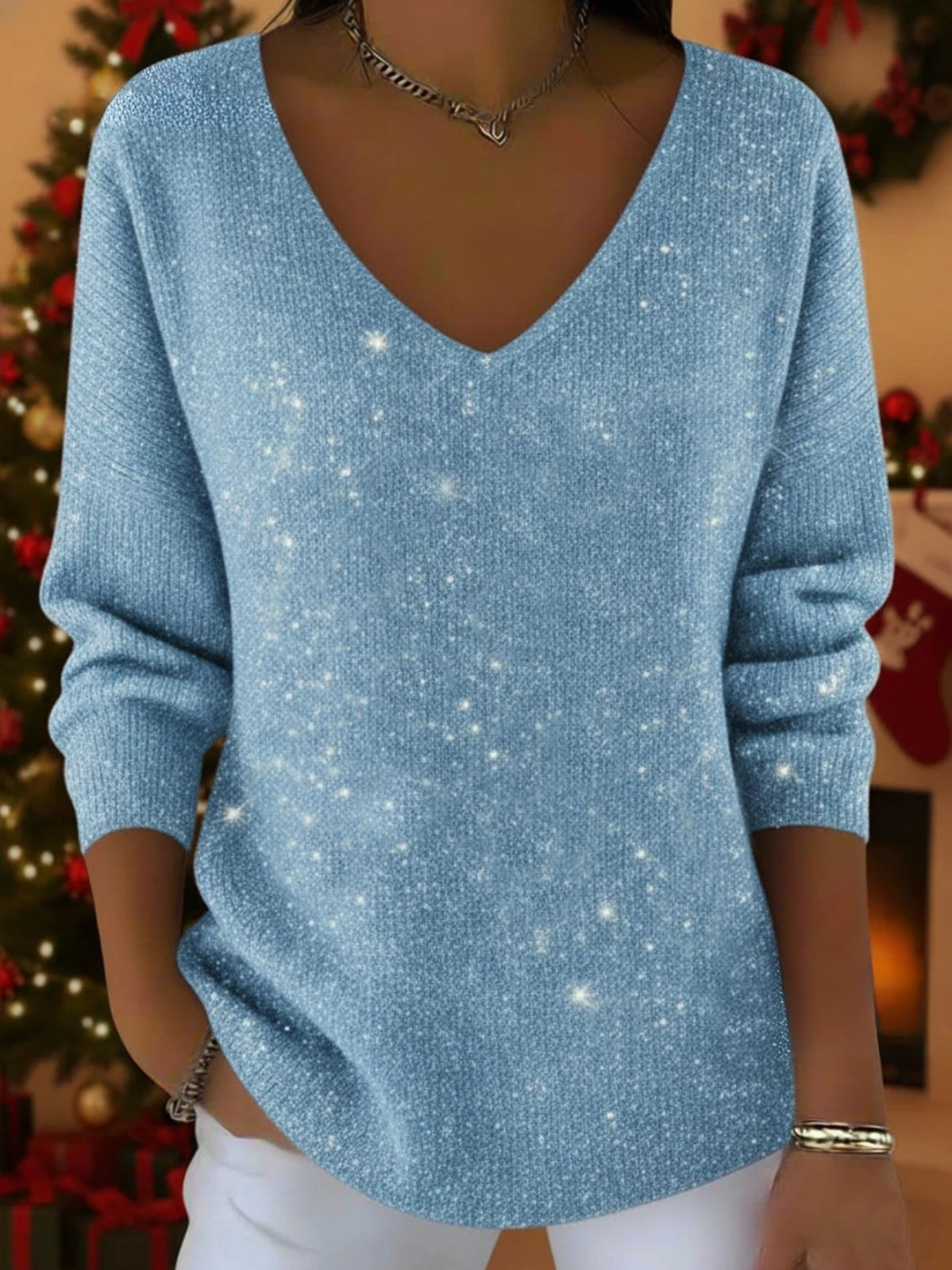 Pull femme élégant à manches longues, col V. Effet scintillant, idéal pour soirées, fêtes ou un look hiver chic.