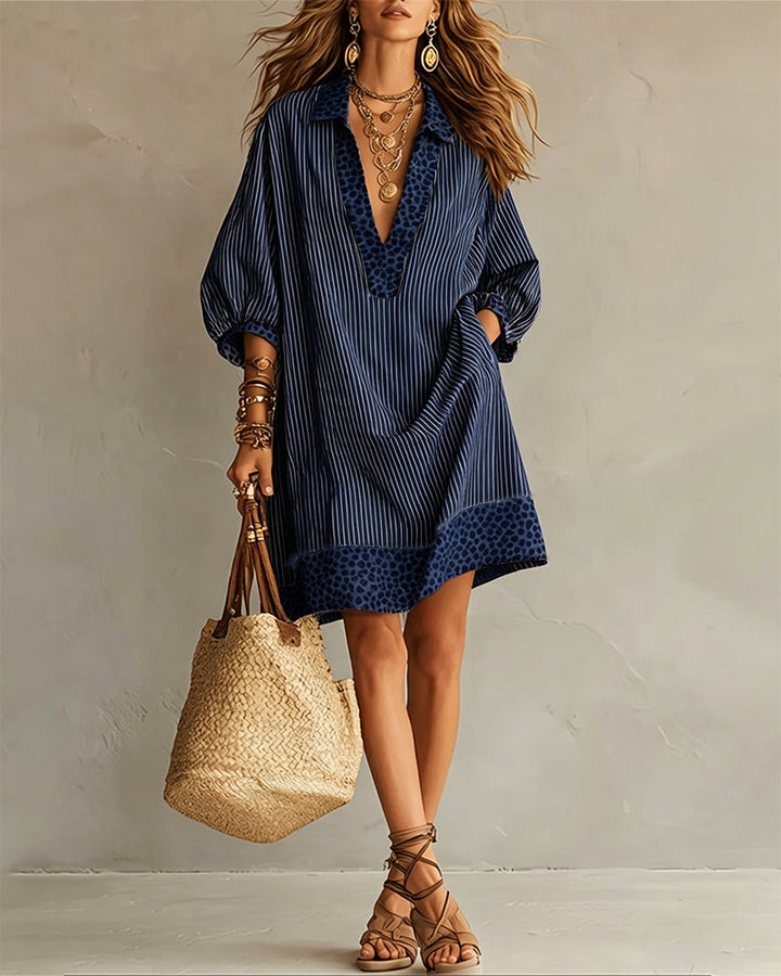 Robe chemisier femme élégante, imprimé léopard audacieux et rayures, manches bouffantes, coupe fluide.