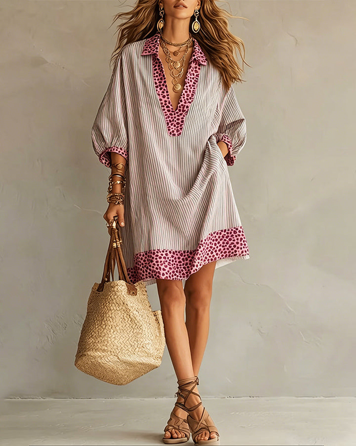 Robe chemisier femme tendance, manches bouffantes, motif léopard et rayures pour un look bohème.