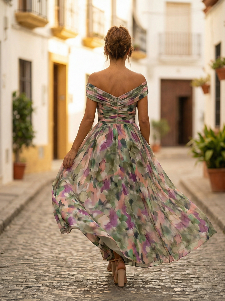 Robe longue élégante, col V, épaules dénudées. Idéale pour gala, mariage ou soirée spéciale femme.