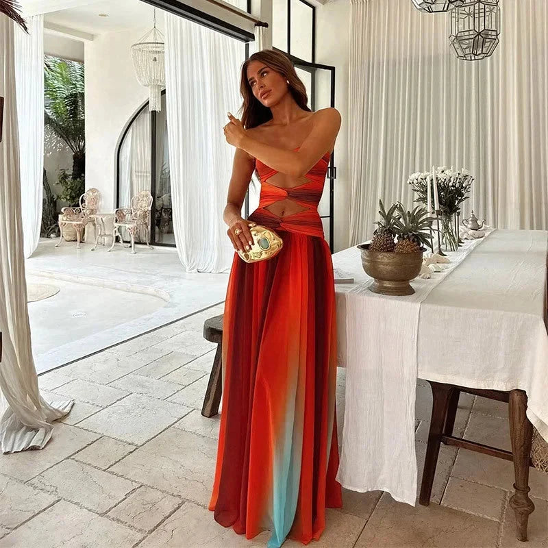 Robe maxi femme sans bretelles, élégante, avec découpes au bustier et fente latérale. Idéale pour une soirée.