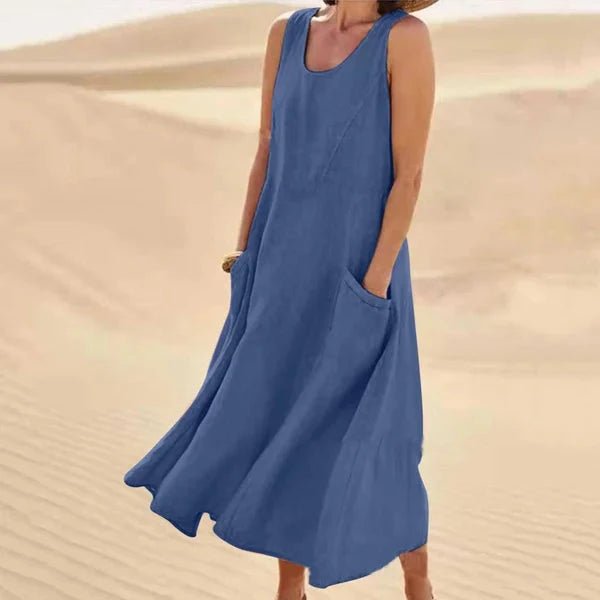 Robe d'été sans manches pour femme, modèle long avec poches, look décontracté facile.