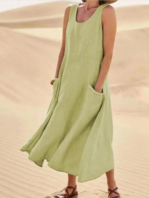 Robe femme estivale avec col rond et poches discrètes, un classique intemporel.