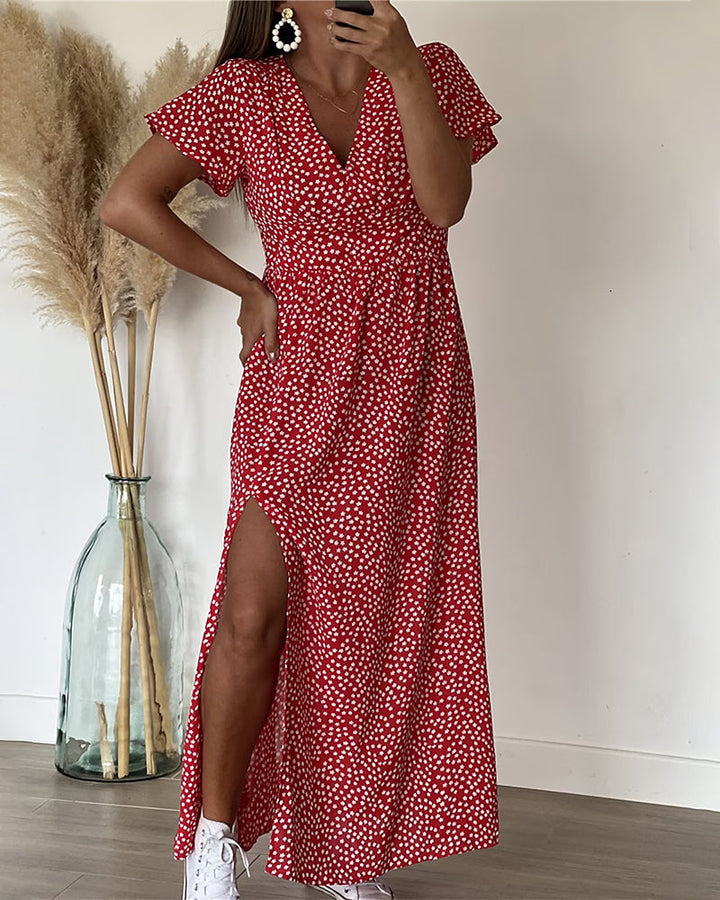 Magnifique robe maxi femme à motifs floraux, manches à volants et col en V. Idéale pour l'été bohème.