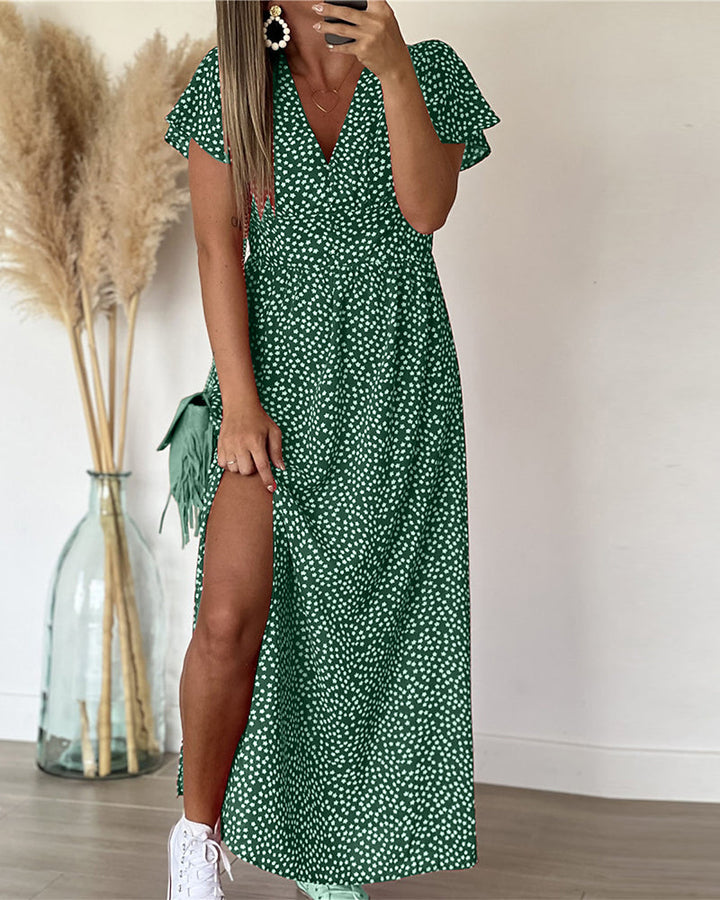 Robe longue femme a-line fleurie, style bohème chic avec volants aux manches. Confort et élégance estivale.