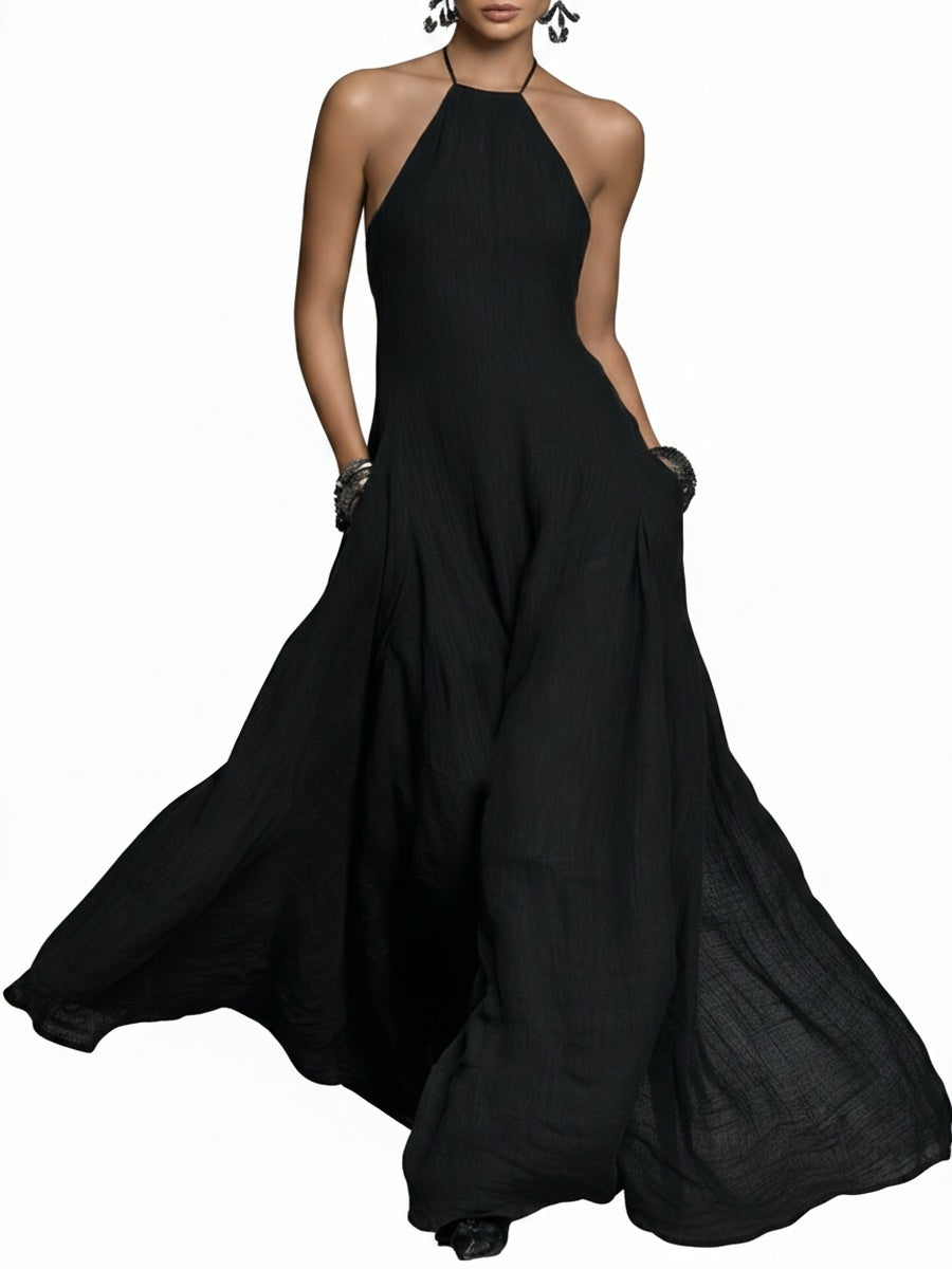Robe maxi femme élégante col halter, fluide, sans manches, avec poches. Idéale pour plage & vacances.