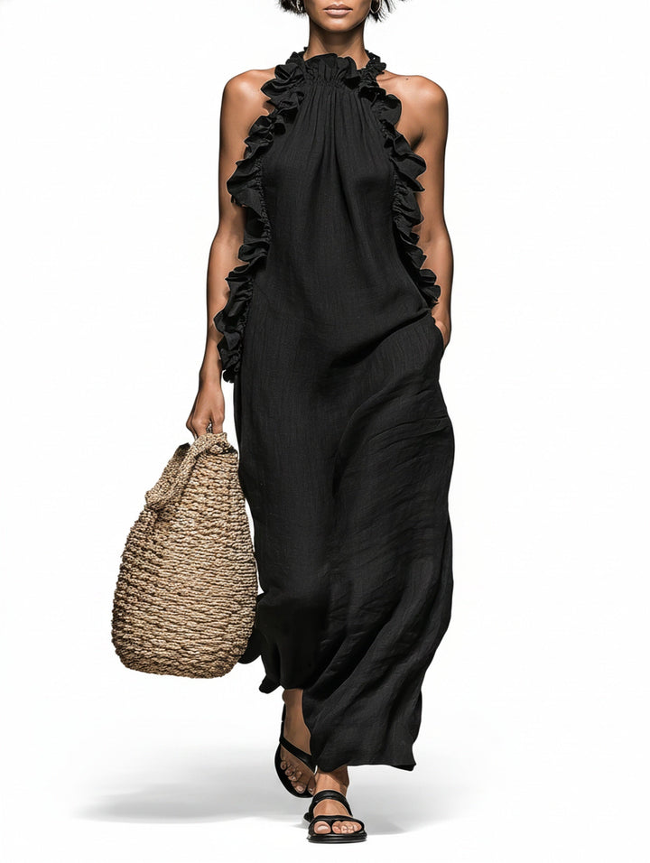 Robe maxi fluide femme à col halter, sans manches, avec volants. Élégante et légère pour l'été.