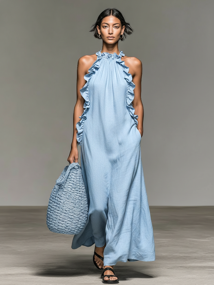Robe d'été femme sans manches, coupe fluide et volants. Idéale pour un look léger et élégant.