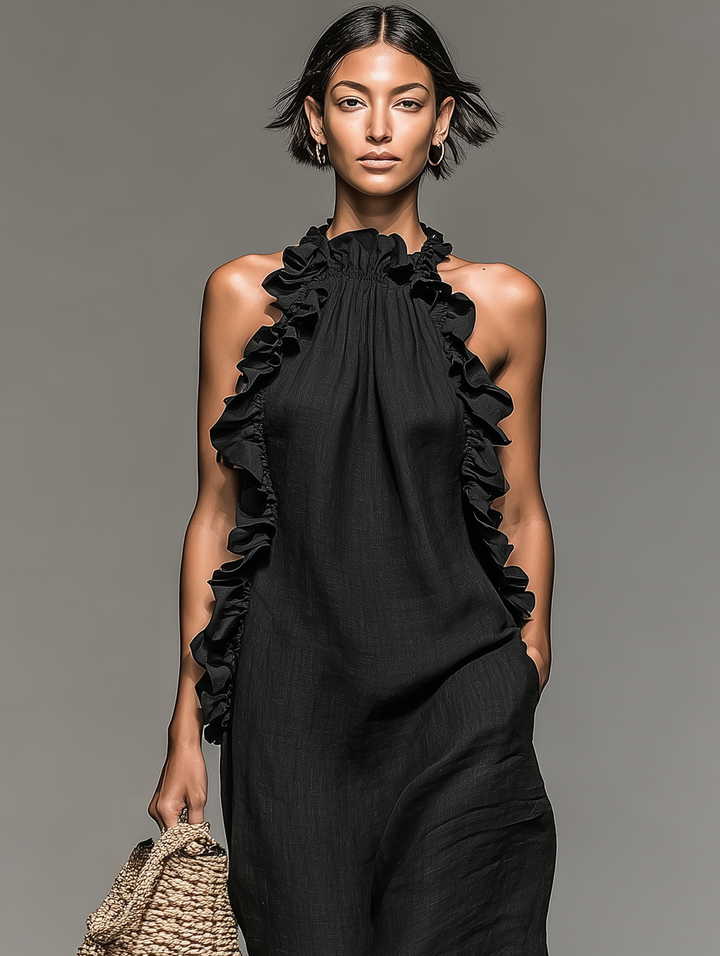 Robe fluide élégante et décontractée femme. Col halter, sans manches, volants. Parfaite pour l'été.