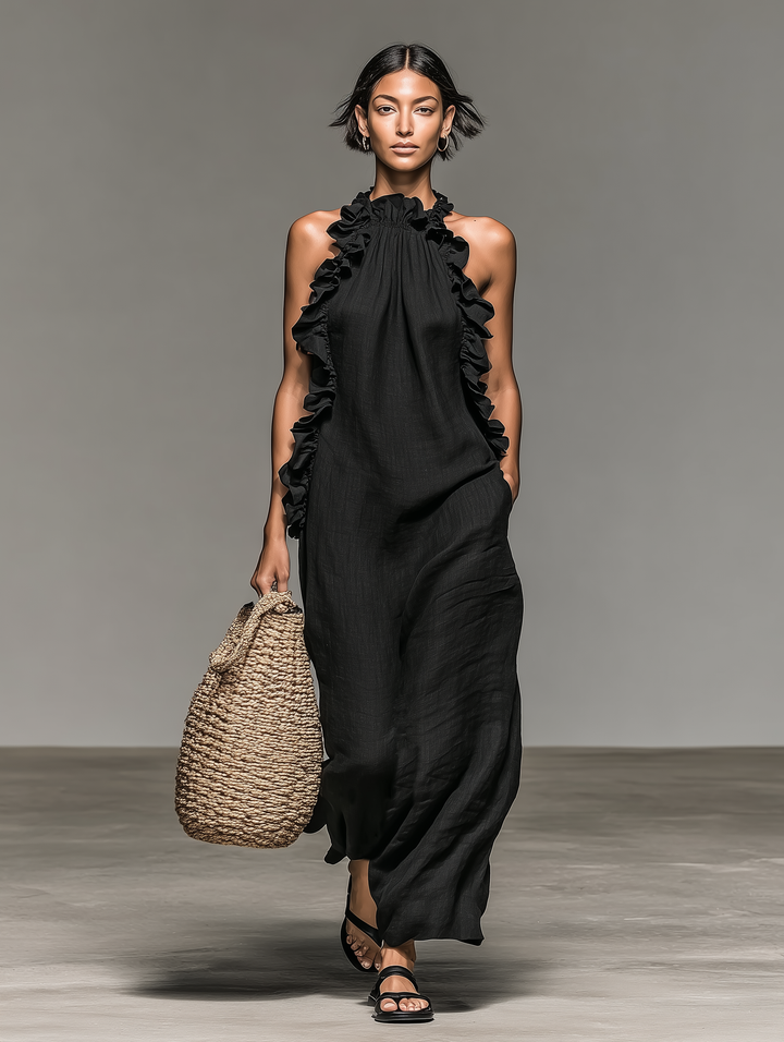 Robe longue bohème femme à volants, fluide et sans manches. Style élégant pour l'été et les vacances.