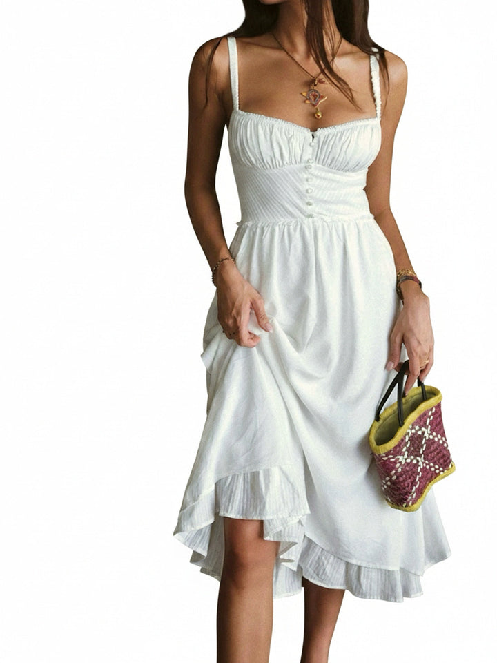 Robe midi femme élégante à bretelles, décolleté carré et volants fluides. Tenue chic pour soirée ou vacances.