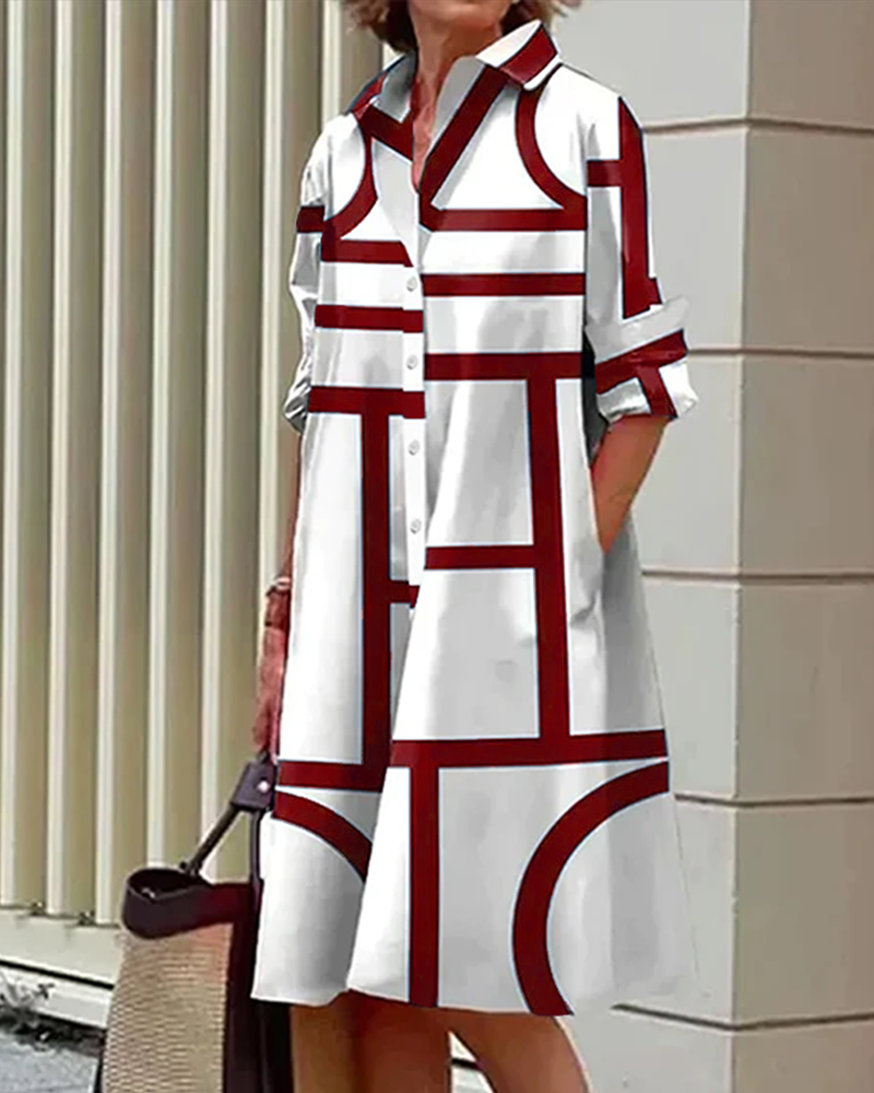 Robe femme chic à imprimé géométrique, col chemise, manches 3/4, longueur midi.