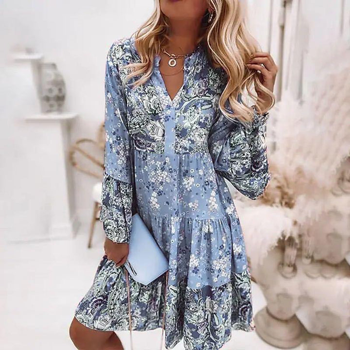 Robe midi femme à imprimé fleuri bohème chic. Manches longues élégantes pour une mode estivale.