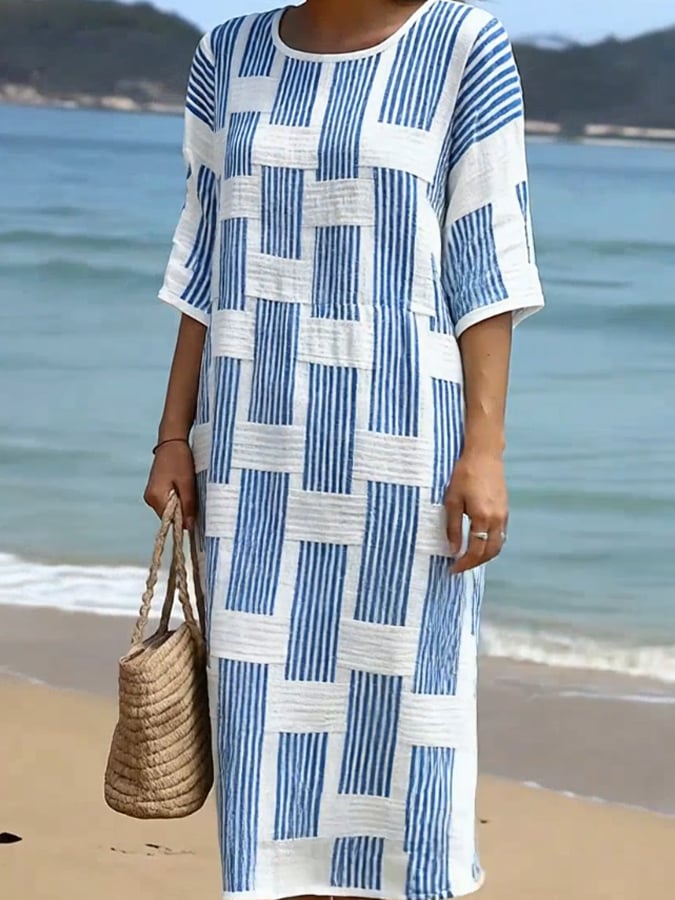 Robe midi femme confortable en coton lin imprimé. Manches mi-longues, parfaite pour une tenue estivale décontractée.