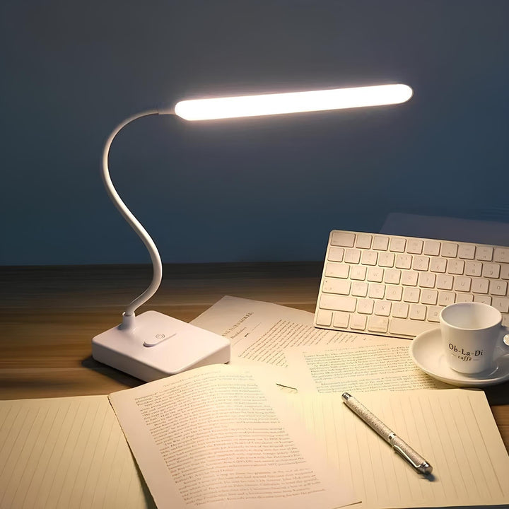 Lampe de lecture LED rechargeable USB, dimmable, pour un confort visuel optimal au bureau.