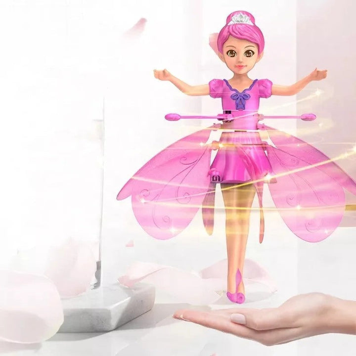 Jouet interactif: poupée volante magique pour enfants, activée par des gestes pour flotter.