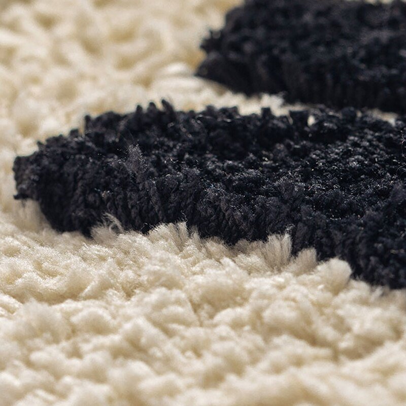 Tapis de bain antidérapant et lavable en machine, séchage rapide, sécurité et hygiène garanties.