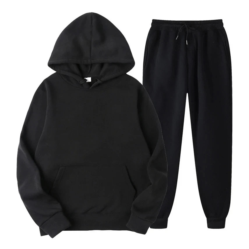 Mode décontractée homme : survêtement élégant gris avec détails soignés, idéal pour un look quotidien relax.