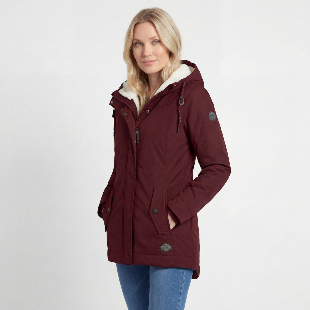 Manteau femme élégant et matelassé, imperméable pour l'hiver. Assure chaleur et protection avec style.