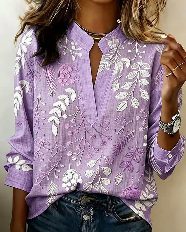 Chemisier femme floral fluide élégant, col V, idéal printemps-été.