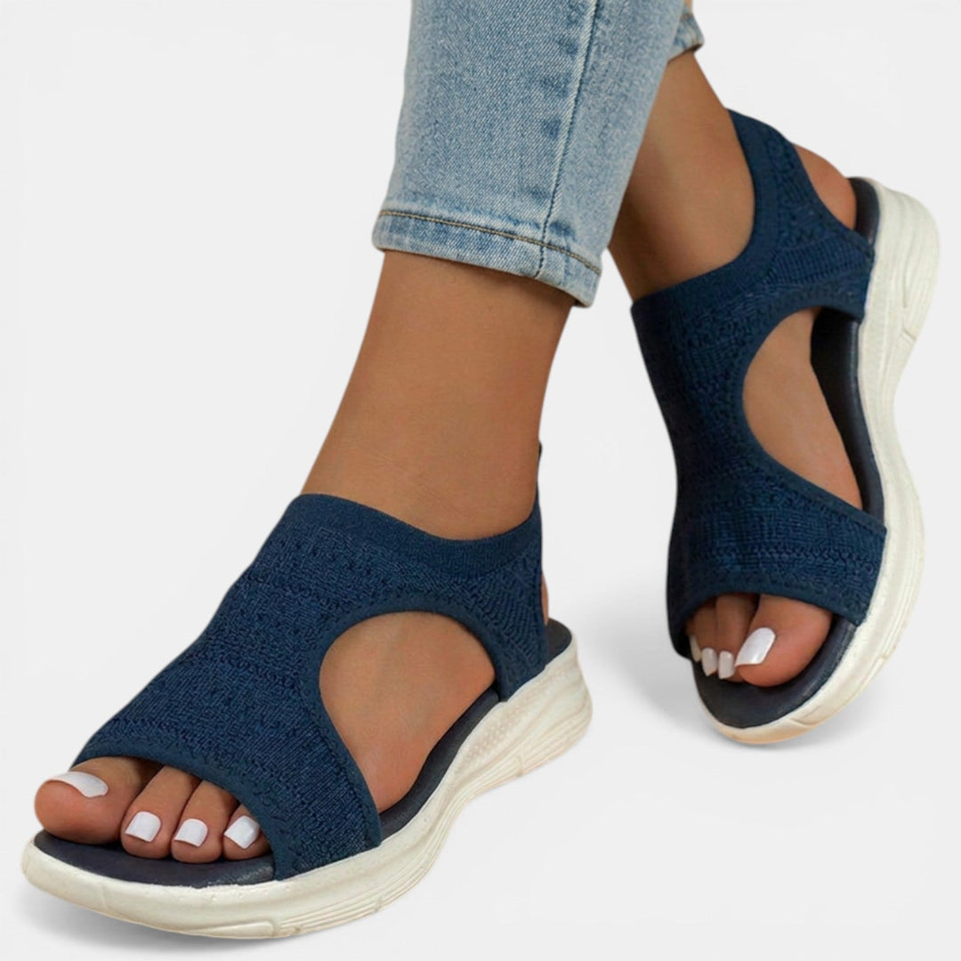 Sandales orthopédiques plates à enfiler pour femmes, confort quotidien et soutien voûte plantaire.