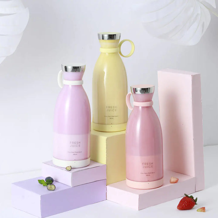 Mixeur portable rechargeable rose pour smoothies frais, jus de fruits et boissons saines en voyage ou fitness.