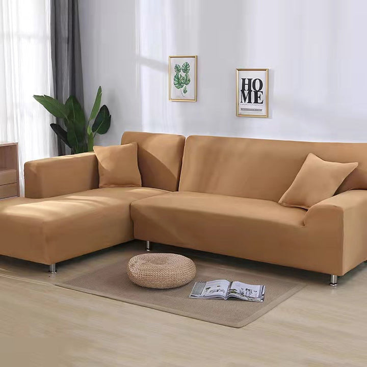 Housse canapé extensible en velours. Protection animaux, relooking salon, entretien facile. Le tout en un.