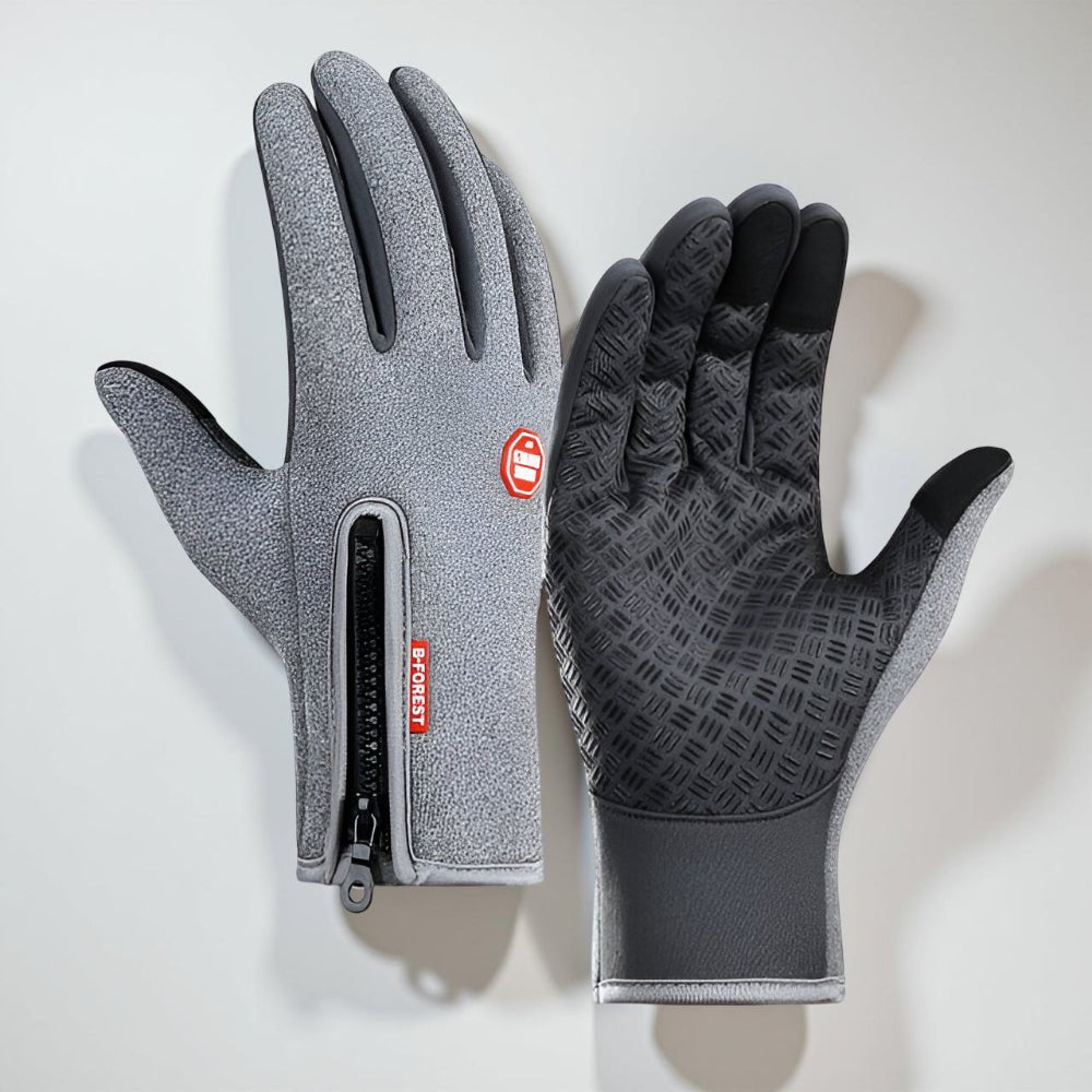 Gants chauffants noirs assurant chaleur et confort contre le froid pour le vélo, le ski et les activités d'hiver.